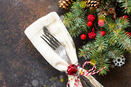 Decor Christmas table on a background of dark stone. Flat lay, top view.