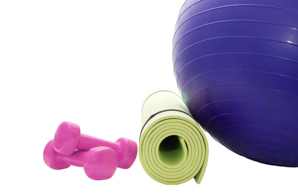istock Fitness ball, dumbbells, Mat isolated on white background. 1077727208