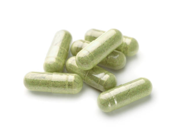 istock Herbal medicine capsules 1077727602
