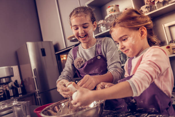 istock Joyful nice girls studying in the cooking academy 1077730292