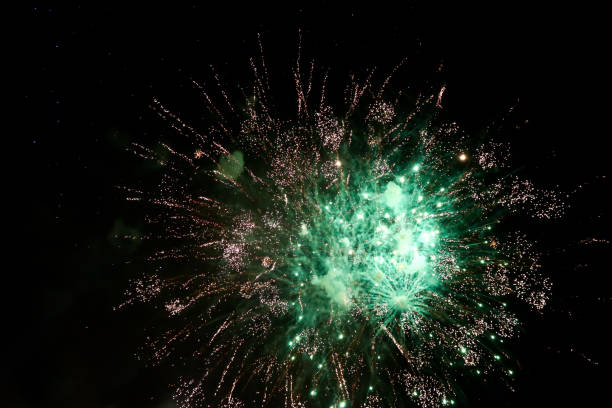 istock Colorful fireworks over dark sky 1077735918