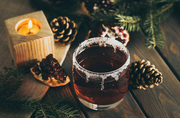 istock Hot mulled wine and a burning candle. Festive Christmas Decorations 1077738028