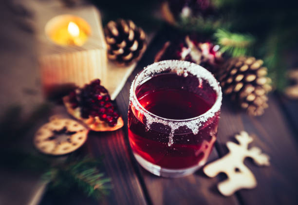 istock Hot mulled wine and a burning candle. Festive Christmas Decorations 1077738058