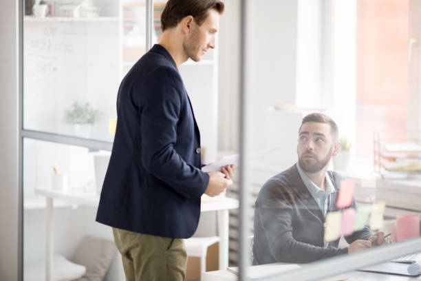istock HR Manager Talking to Employee 1077740280