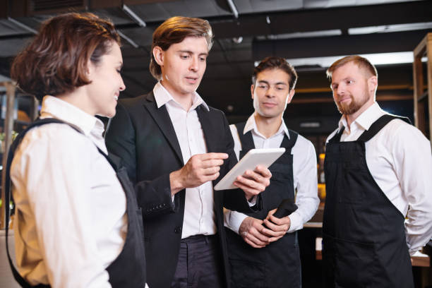 istock Briefing of waiters 1077746446