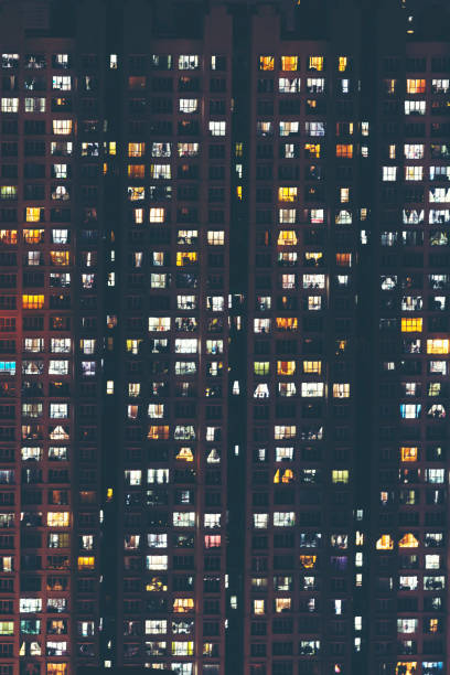 istock abstract texture background of building night light 1077755022