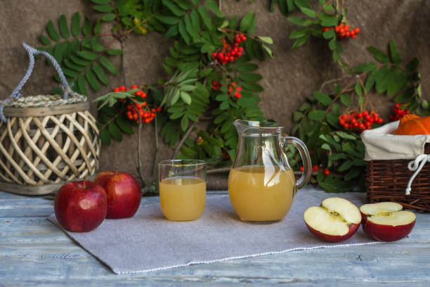 istock autumn composition with apples and apple juice in a jug 1077755558
