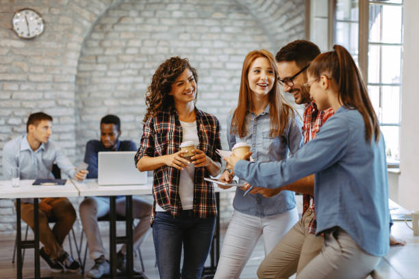 istock Young freelance team at a coffee break in the office 1077770536