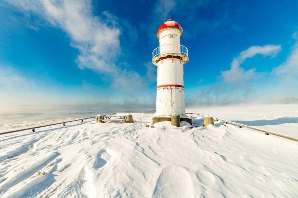 istock Lac St Louis and lighthouse Lachine Quebec in deep mid winter. 1077779136