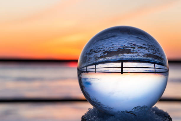 istock Crystal ball and Lac St Louis and lighthouse Lachine Quebec. 1077782936