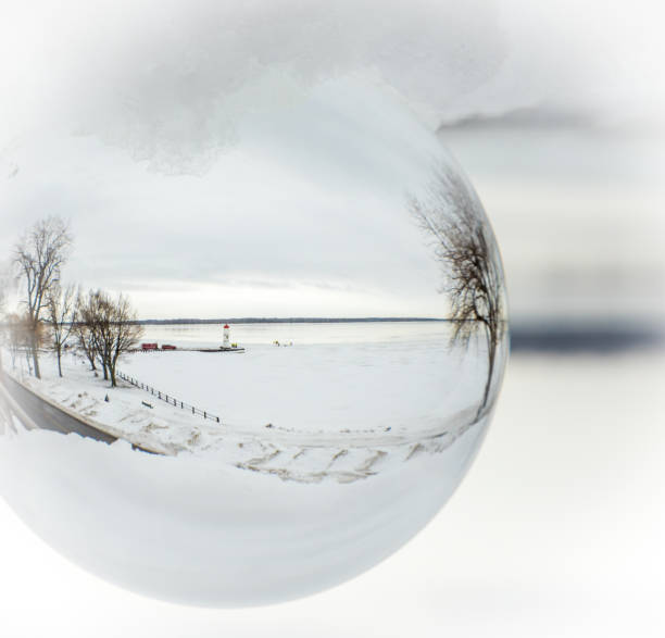 istock Crystal ball and Lac St Louis and lighthouse Lachine Quebec. 1077782966