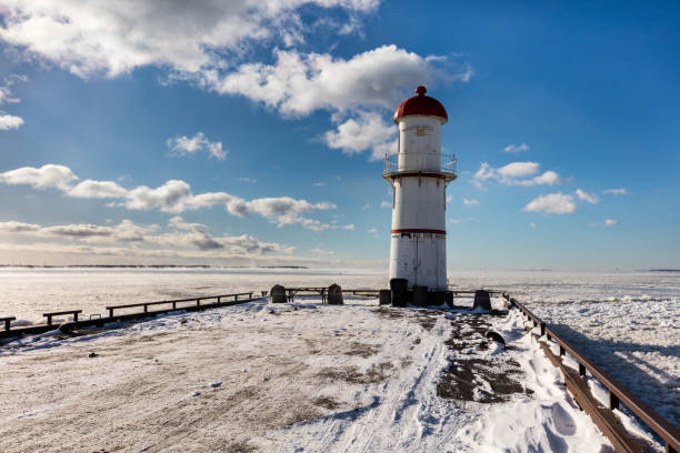 istock Lac St Louis and lighthouse Lachine Quebec in deep mid winter. 1077784708