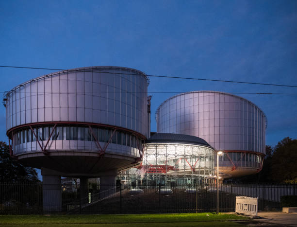 European Court of Human Rights at dusk STRASBOURG, FRANCE - oct 25, 2018: European Court of Human Rights building facade at dusk european court of human rights stock pictures, royalty-free photos & images