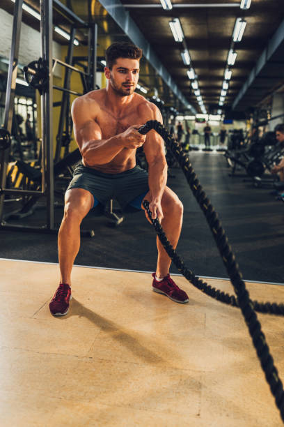 istock Transforming body with the help of ropes 1077797844