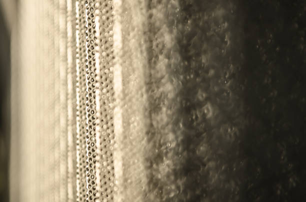 istock Metallic hole pattern in the Navarrabiomed building in Pamplona, 1077804630