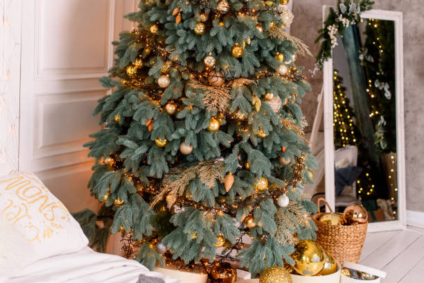 istock Christmas bedroom interior with large Christmas tree 1077808750