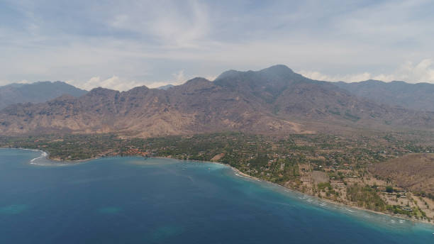 istock tropical landscape with, mountains, beach 1077814120