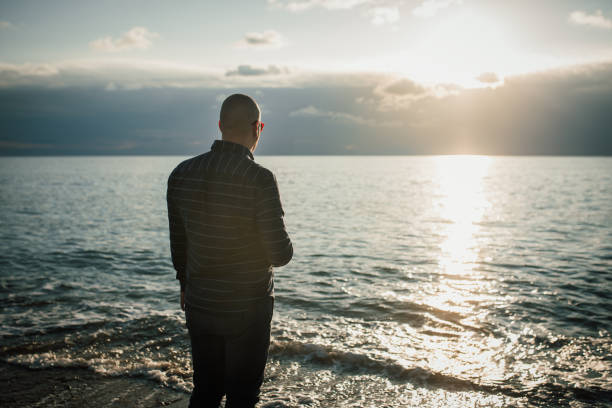 istock Walking the beach in autumn 1077827320