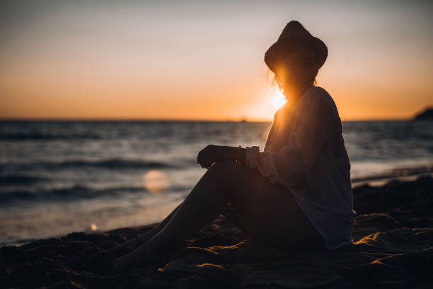 istock Waiting for sunset on the beach 1077827676