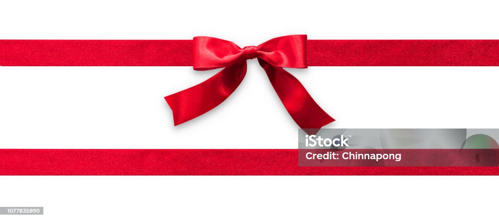 Red ribbon band stripe or satin fabric bow isolated on white background with clipping path for banner design, greeting card and Christmas gift decoration Ribbon - Sewing Item Stock Photo