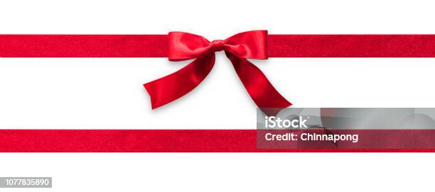 Red Ribbon Band Stripe Or Satin Fabric Bow Isolated On White Background With Clipping Path For Banner Design Greeting Card And Christmas Gift Decoration Stock Photo - Download Image Now