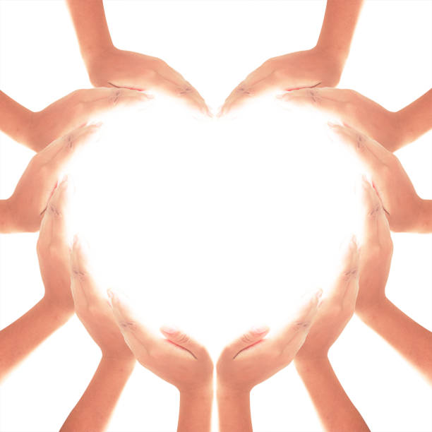 istock International human rights day concept: Human hands in hearth shape isolated on white background 1077856294