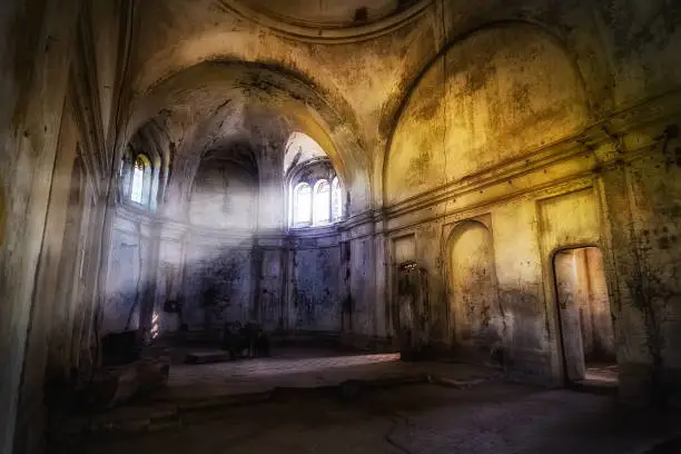 Photo of Mystical fantasy haunted abandoned temple. Interior of abandoned church of Dmitry Solunsky