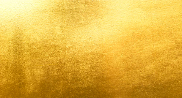 istock Shiny yellow leaf gold metall texture 1077862740