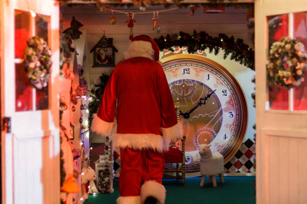 istock Santa claus entering home 1077864020