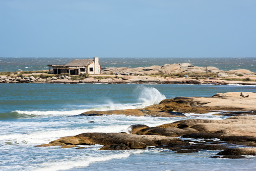 Punta del Diablo Beach, sitio turístico y lugar de los pescadores en la costa de Uruguay photo