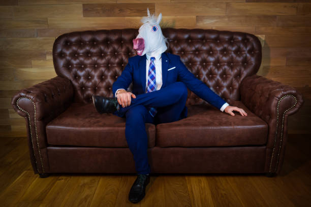 istock Unusual man at home office 1077895698