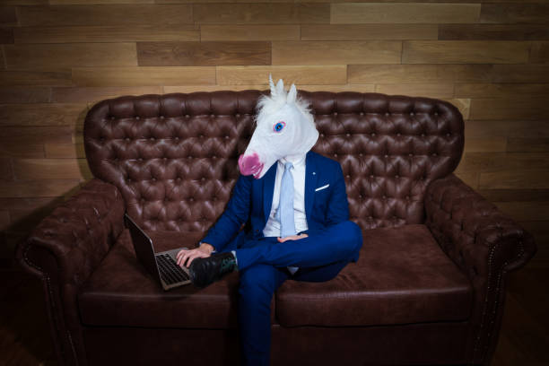 istock Strange guy in elegant suit working in home office 1077895800
