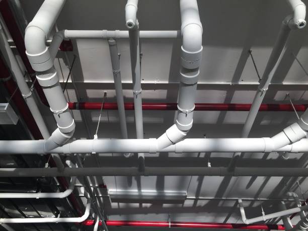 istock PVC Piping hanging underpass building inside the building. 1077903522