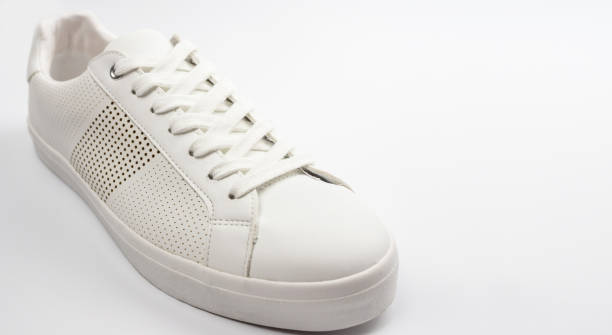 istock White and new sneaker shoe close up on white background 1077905630