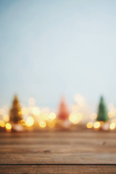 istock Christmas bokeh background with trees and lights 1077906358