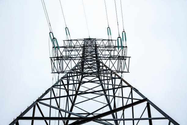 istock Metal frame of an electrical tower in cloudy weather 1077906418