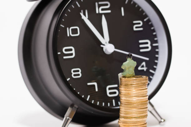 Business man showing the watch as meeting reminder concept