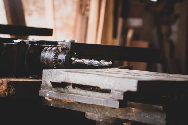 istock Carpenter working with circular saw woodworking machine in a carpentry 1077918446