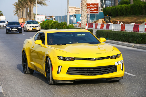 Dubai, UAE - November 16, 2018: American muscle car Chevrolet Camaro in the city street.
