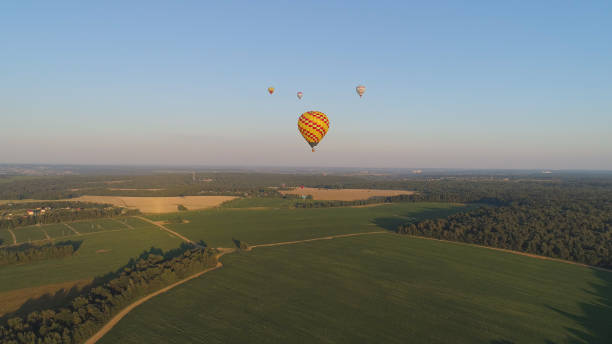 istock Hot air balloons in sky 1077920920