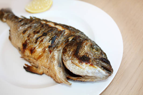 istock Dorada fish grilled on the plate 1077921446