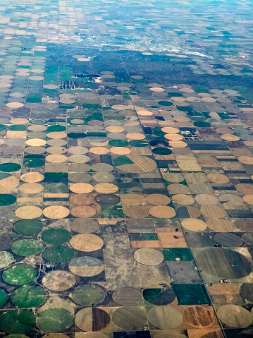 Aerial view of land irrigated with water from Ogallala Aquifer near Garden City, Kansas, USA. Ground water from the aquifer is being extracted faster than it can be replenished.