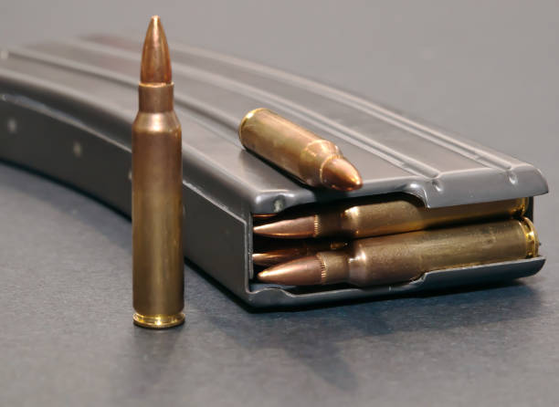 istock A rifle magazine loaded with .223 bullets on a gray background 1077922772