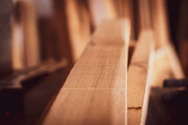 istock wood lumber from sawmill material in carpenter workshop 1077923224