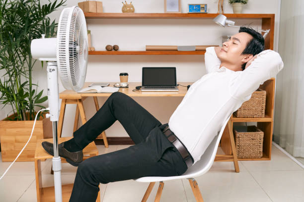 istock Businessman relaxing at office 1077938994