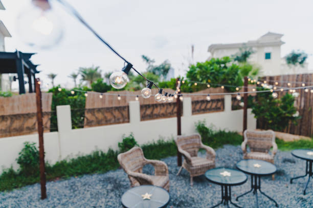 istock Series Lights on a Patio Setup in a Garden 1077943540