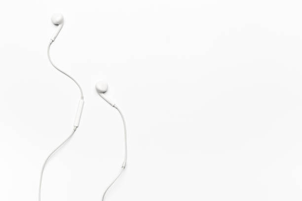 istock white Earphones isolated on white background 1077944576