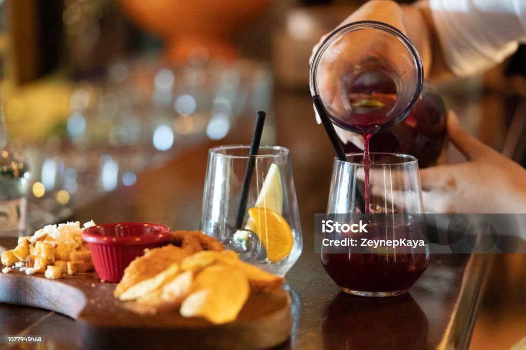 Sangria and Tapas Selective focus on sangria. Cocktail Stock Photo