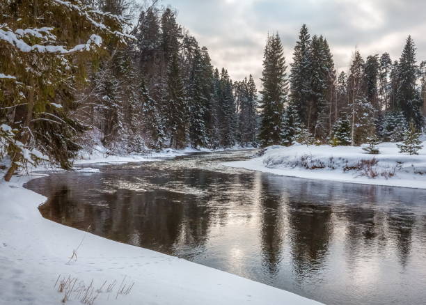 istock Winter river on a sunny, clear day. 1077952298