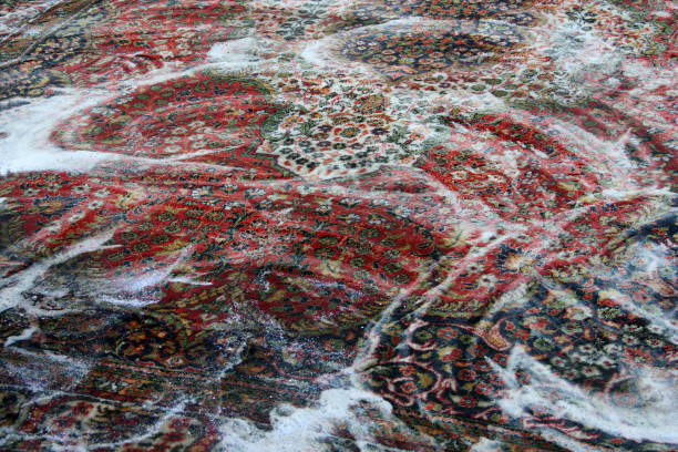 turkish karaman carpet turkish karaman carpet coavered with soap rug cleaning stock pictures, royalty-free photos & images